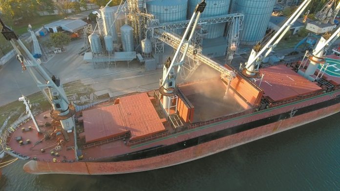 Aerial,View,Of,Big,Grain,Elevators,On,The,Sea.,Loading